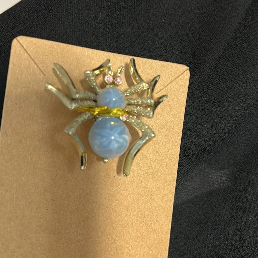 Elegant Gold and Blue Spider Brooch